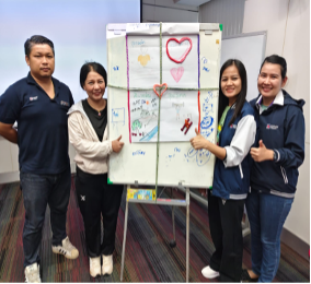 Nippon Paint Thailand participants presenting a group activity